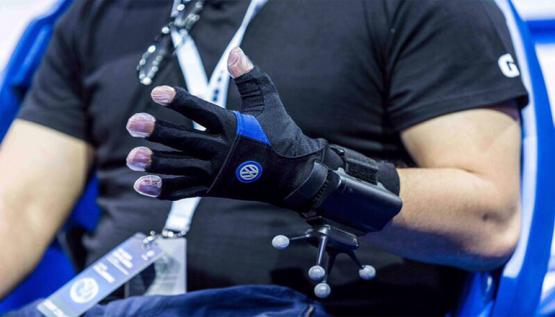 A virtual reality glove by Noitom is shown at the Shanghai International Automobile Industry Exhibition.